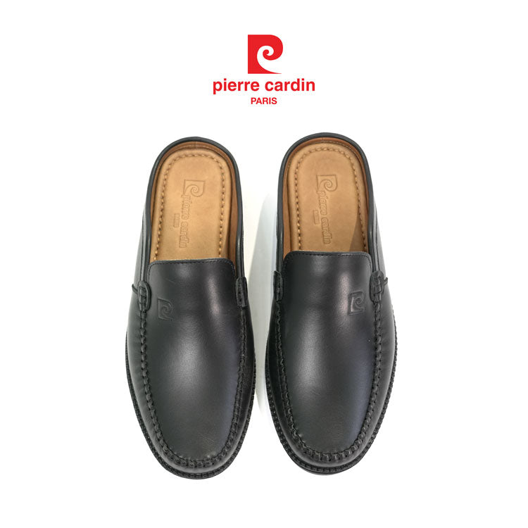 A pair of black leather mule loafers by Pierre Cardin, shown from a top-down view on a white background with the red and black Pierre Cardin logo centered above the shoes.
